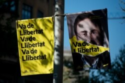 Предвыборный плакат в поддержку партии «Левая республика Каталония» (Esquerra Republicana de Catalunya, ЕRC) накануне выборов в парламент Испании, Барселона, апрель 2019 года