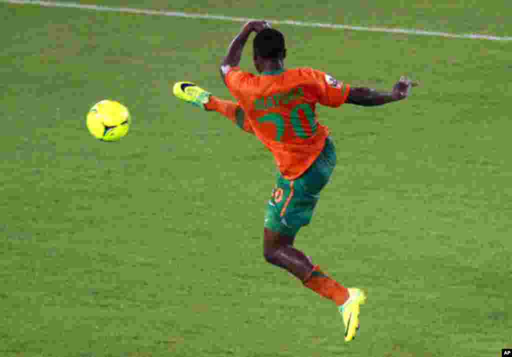Mayuka of Zambia kicks to score a goal against Libya during their African Nations Cup Group A soccer match at Estadio de Bata "Bata Stadium", in Bata
