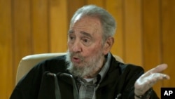Former Cuban leader Fidel Castro speaks during a meeting with Cuban and foreign intellectuals visiting Havana's international book fair February 15, 2011.
