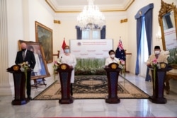 Dari kiri: Menhan Australia Peter Dutton, Menlu Australia Marise Payne, Menlu RI Retno Marsudi dan Menhan RI Prabowo Subianto, memberikan keterangan kepada media di kantor Kememlu RI, Jakarta, 9 September 2021. (Kemlu RI)