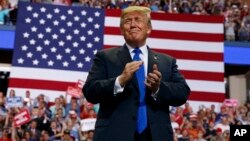 President Donald Trump arrives to speak at a campaign rally at the Landers Center Arena, Oct. 2, 2018, in Southaven, Mississippi. 