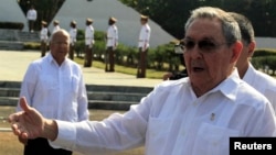 Cuba's President Raul Castro talks to the media after a wreath-laying ceremony at the Soviet Soldier monument in Havana, February 22, 2013. 