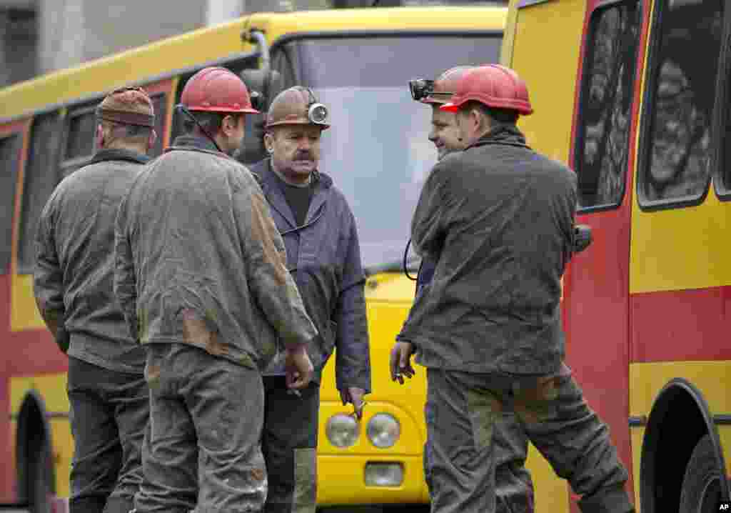 Miners gather near the Zasyadko coal mine after an explosion, in Donetsk, Ukraine, March 4, 2015.