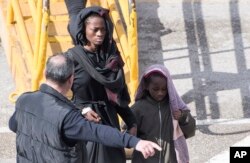 Migrants are disembarked from the Turkish oil tanker El Hiblu 1, which was hijacked by migrants, in Valletta, Malta, March 28, 2019.