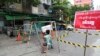 ကိုရိုနာဗိုင်းရပ်စ် ကူးစက်ပျံ့နှံ့မှု တိုးနေတဲ့ ရန်ကုန်မြို့မှာ အသွားအလာ ကန့်သတ်ပိတ်ဆို့ထားတဲ့ လမ်းတခု။ (စက်တင်ဘာ ၁၁၊ ၂၀၂၀)