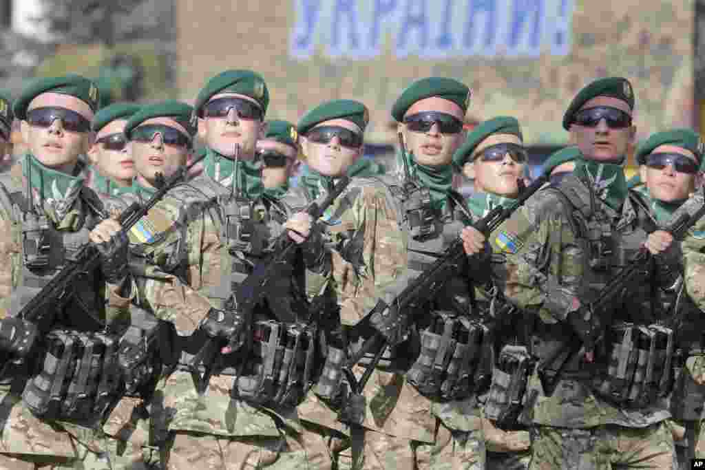 Ukrainian soldiers march down Kyiv&#39;s main street during a military parade on the occasion of the 23rd anniversary of the country&#39;s independence, in the capital.