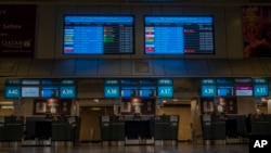 Some foreign airlines check-in counters remain closed at Johannesburg's OR Tambo's airport, South Africa, Nov. 29, 2021. 