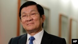 FILE - Vietnamese President Truong Tan Sang listens to questions during an interview, Sept. 28, 2015, in New York. Sang has said that China’s island-building in the disputed South China Sea violates international law and endangers maritime security.