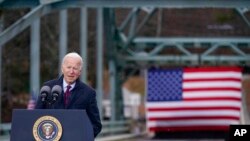 President Joe Biden speaks during a visit to the NH 175 bridge over the Pemigewasset River to promote infrastructure spending, in Woodstock, N.H., Nov. 16, 2021. 