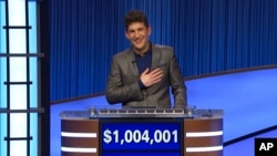 This photo provided by Jeopardy Productions Inc. shows “Jeopardy!” contestant Matt Amodio after his total win amount was announced, Sept. 24, 2021.
