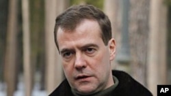 Russia's President Dmitry Medvedev speaks to the media at the Gorki residence outside Moscow, March 21, 2011