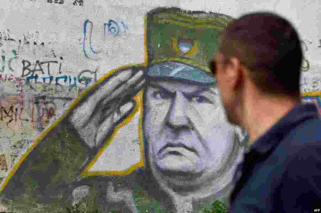 May 26: Graffiti of war crimes fugitive Bosnian Serb army commander Ratko Mladic seen in Belgrade, Serbia. Serbia's President Boris Tadic confirms war crimes fugitive Ratko Mladic has been arrested. (AP Photo)