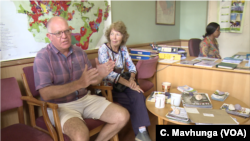 Glen Johnston and his mother, Agnes, sit at the Zimbabwe Commercial Farmers Union offices in Harare, April 16, 2019. She was displaced from her farm 17 years ago without compensation.