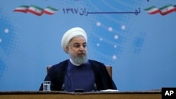 Trong bức ảnh do Phủ TT Iran công bố, TT Hassan Rouhani dự một hội nghị các quan chức ngoại giao nước ngoài ở Tehran, Iran, ngày 22/7/2018.