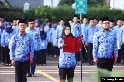 ASN mengikuti upacara bendera. (Foto: Humas PANRB)