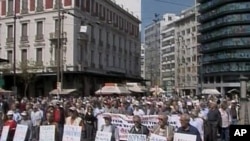 Citizens in Greece take to the streets to protest the cut in retirement pensions as the nation faced possible bankruptcy