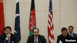 FILE - Afghanistan's Foreign Minister Salahuddin Rabbani, center, speaks during a one-day meeting with Pakistan, U.S. and Chinese delegations in Kabul, Jan. 18, 2016. The talks are aimed at ending the country's 15 years of war with the Taliban.