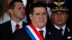 Paraguay's President Horacio Cartes participates in a military parade marking Independence Day, in Asuncion, May 15, 2018. Paraguay's government says President Horacio Cartes will open the country's new embassy to Israel in Jerusalem, following similar steps by the United States and Guatemala.