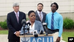 FILE - Jennifer Riley-Collins, executive director of the American Civil Liberties Union of Mississippi, speaks in Jackson about a lawsuit the group had filed in her state, May 9, 2016. Nationally, since the election of Donald Trump as president, the ACLU has seen the largest surge of support in its 94-year history.