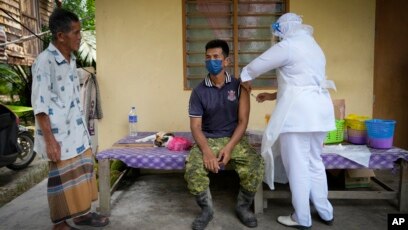 Southeast Asia Factories Hurt By Virus Vaccination Problems