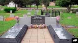 This April 12, 2019, photo shows the gravesite of James Byrd Jr. in Jasper, Texas. Byrd was killed on June 7, 1998, in what is considered one of the most gruesome hate crime murders in recent Texas history. Byrd's gravesite had been surrounded by a fence but was desecrated twice.