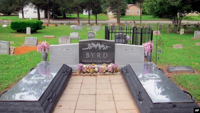 This April 12, 2019, photo shows the gravesite of James Byrd Jr. in Jasper, Texas. Byrd was killed on June 7, 1998, in what is considered one of the most gruesome hate crime murders in recent Texas history. Byrd's gravesite had been surrounded by a fence but was desecrated twice.