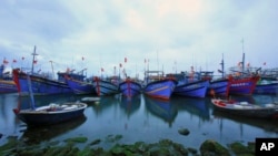 FILE - Fishing boats are docked in Tho Quang port, Danang, Vietnam, March 26, 2016. Fishermen from around the South China Sea tell stories of contending with bandits and coast guards.