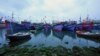 FILE - Fishing boats are docked in Tho Quang port, Danang, Vietnam, March 26, 2016. Fishermen from around the South China Sea tell stories of contending with bandits and coast guards.