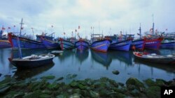 FILE - Fishing boats are docked in Tho Quang port, Danang, Vietnam, March 26, 2016. Fishermen from around the South China Sea tell stories of contending with bandits and coast guards.