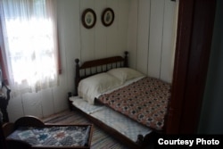 A young Herbert Clark Hoover shared this bedroom with his parents and siblings.