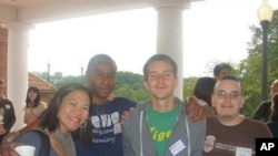 Valentin Villalbi, third from left, poses during one of Georgetown University's international students meetings