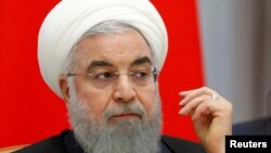 FILE - Iranian President Hassan Rouhani attends talks in the Black Sea resort of Sochi, Russia, Feb. 14 2019. 