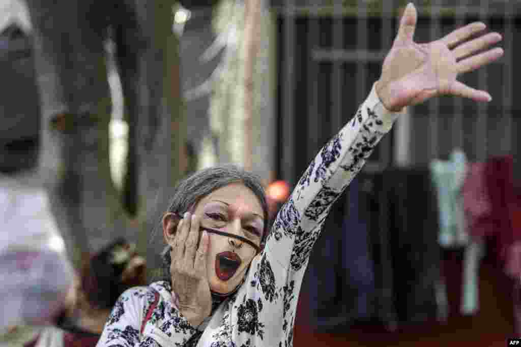 A reveler attends an event in support of a program created by members of the LGBT community to give free meals to homeless people amid the new coronavirus pandemic, during the celebration of gay pride in Mexico City, June 27, 2020.