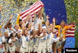 The US Women's soccer teams celebrates their victory over the Netherlands. July 7, 2019