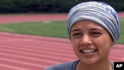 Sarah Attar, atlet putri pertama Arab Saudi yang berlomba dalam cabang atletik Olimpiade dan turun pada nomor 800 meter (8/8).
