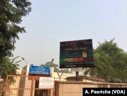 A Board shows pollution levels as "very poor" in New Delhi.