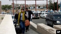2013年8月6日，国际人士纷纷前往也门首都萨那的国际机场，准备离开也门。