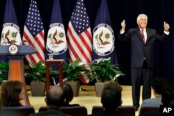 FILE - Secretary of State Rex Tillerson gives the thumbs-up as he arrives to speak to State Department employees, May 3, 2017, at the State Department in Washington.