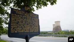 Shown are the unit 2 cooling towers at the Three Mile Island nuclear power plant in Middletown, Pa., Monday, May 22, 2017. (AP Photo/Matt Rourke)