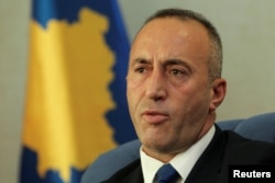 FILE - Kosovo's Prime Minister Ramush Haradinaj talks during an interview with Reuters in Pristina, Kosovo, Oct. 16, 2017.