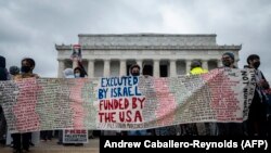 Para pendukung Palestina menggelar unjuk rasa di Monumen Lincoln di Washington DC, Sabtu, 29 Mei 2021. (Foto: Andrew Caballero-Reynolds/AFP)
