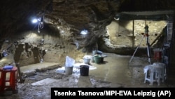 This image provided by Tsenka Tsanova in May 2020 shows excavation work at the Bacho Kiro Cave in Bulgaria.