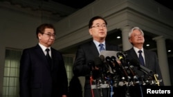 South Korea's National Security Office head Chung Eui-yong, center, Cho Yoon-je, the South Korean Ambassador to the U.S., right, and National Intelligence Service chief Suh Hoon, left, make an announcement about North Korea and the Trump administration.