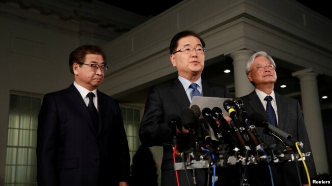 South Korea's National Security Office head Chung Eui-yong, center, Cho Yoon-je, the South Korean Ambassador to the U.S., right, and National Intelligence Service chief Suh Hoon, left, make an announcement about North Korea and the Trump administration last week.