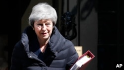 FILE - Britain's Prime Minister Theresa May is pictured outside her official residence in London, May 1, 2019.