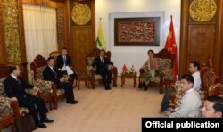 Chinese Foreign Minister Wang Yi with Myanmar Foreign Minister Aung San Suu Kyi in Ministry of Foreign Affair at Naypyitaw April 5, 2016.