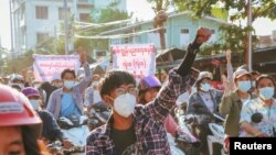 People protest in Mandalay, Myanmar in this picture obtained from social media dated May 16, 2021. PHOTO OBTAINED BY REUTERS/via REUTERS THIS IMAGE HAS BEEN SUPPLIED BY A THIRD PARTY. 