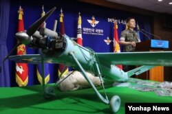 A small aircraft, which South Korea's Military says is a drone from North Korea, is seen at the Defense Ministry in Seoul, South Korea, June 21, 2017.