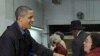 Obama Family Volunteers at Local Food Bank