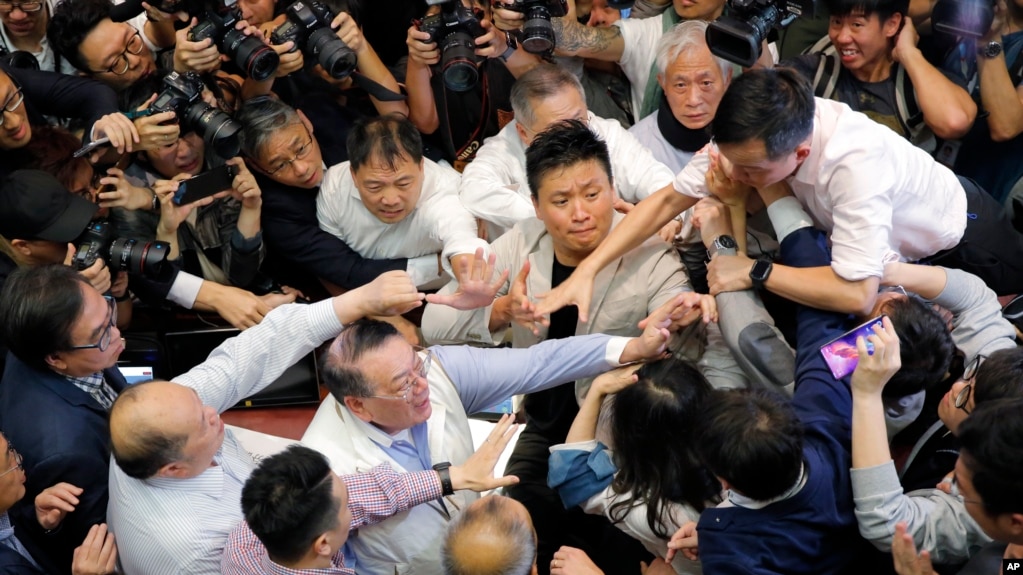 Hong Kong Lawmakers Brawl Over Extradition Bill Hong Kong Lawmakers Brawl Over Extradition Bill